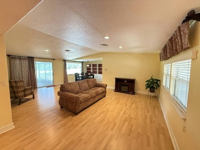 This 3 bed, 2 bath home in the 55+ Fairways Country Club is - photo 2
