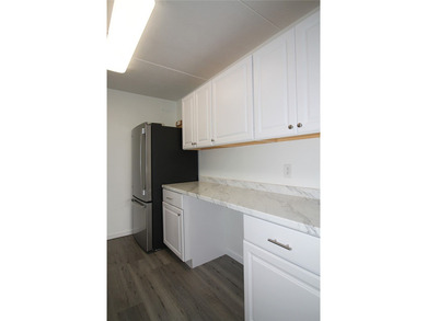 MOVE RIGHT INTO THIS SPARKLING UNIT LOCATED ON THE PENTHOUSE - photo 14