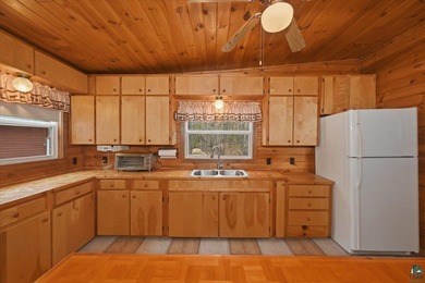 Discover this inviting 4-bedroom, 1-bath home on 3.26 wooded - photo 15