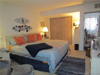 Top-floor waterfront condo featuring 3 bedrooms, 2 bathrooms