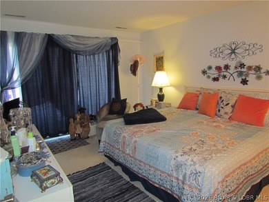 Top-floor waterfront condo featuring 3 bedrooms, 2 bathrooms