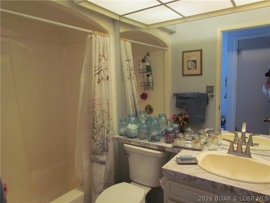 Top-floor waterfront condo featuring 3 bedrooms, 2 bathrooms