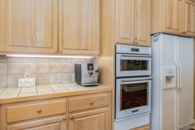 Welcome to refined living on the Wynlakes Golf Course. Situated - photo 20