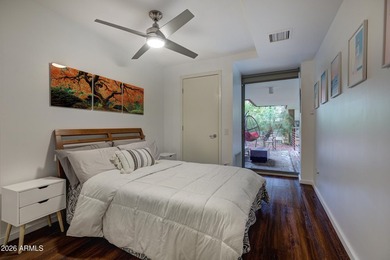 Perfectly positioned within the lush interior courtyard of the