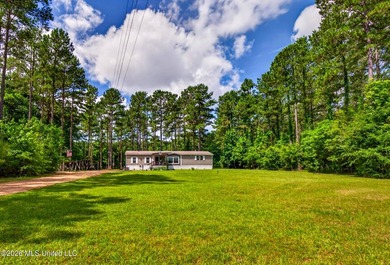 Escape to your own private outdoor paradise with this 3-bedroom - photo 1