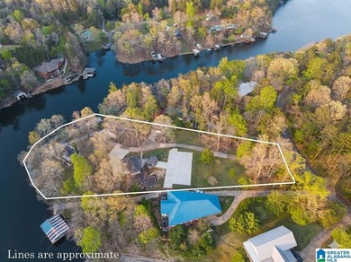 A rare lakefront offering with over 300 feet of shoreline and - photo 1