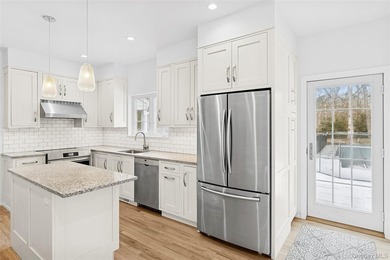 Tucked just off the main corridor in East Hampton, this private - photo 11
