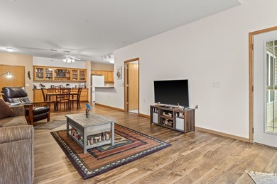 Welcome home to this bright and airy 55+ condominium in the - photo 12