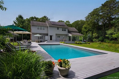 Tucked just off the main corridor in East Hampton, this private - photo 23