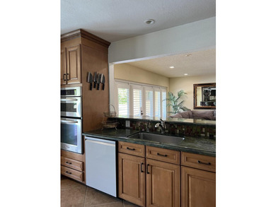Is there a 4-bedroom home in Palm Beach County with acreage - photo 23