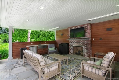 Tucked just off the main corridor in East Hampton, this private - photo 24
