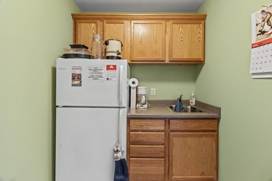 Welcome home to this bright and airy 55+ condominium in the - photo 25