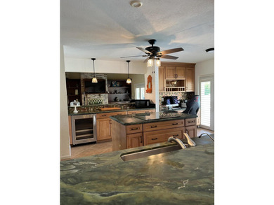 Is there a 4-bedroom home in Palm Beach County with acreage - photo 27