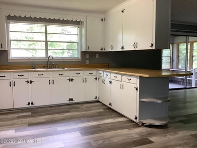Have you been looking for a 4 bedroom 2 bath brick home with a - photo 4