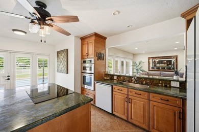 Is there a 4-bedroom home in Palm Beach County with acreage - photo 42