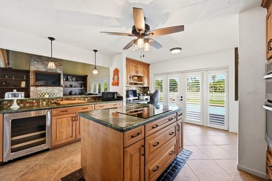 Is there a 4-bedroom home in Palm Beach County with acreage - photo 43
