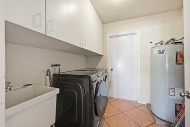 Is there a 4-bedroom home in Palm Beach County with acreage - photo 49
