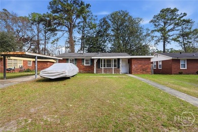 Solid brick ranch home. Two bedroom, one bath, bonus room or - photo 1