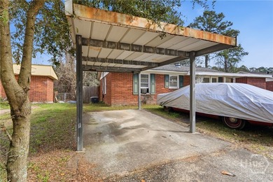 Solid brick ranch home. Two bedroom, one bath, bonus room or - photo 3