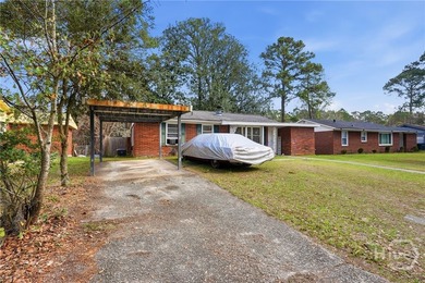 Solid brick ranch home. Two bedroom, one bath, bonus room or - photo 4