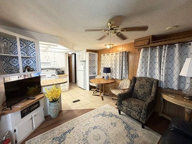 This charming 792 square feet Park Model home, built in 1988 by - photo 3