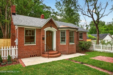 Welcome to this beautiful brick 2-bedroom, 2-bath bungalow in - photo 3