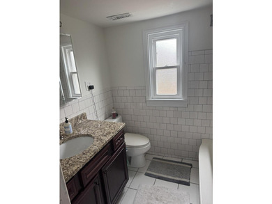 Exceptional investment opportunity or future home! This 4- - photo 11