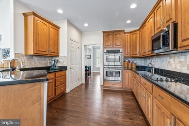 Experience timeless craftsmanship and exceptional living in this - photo 11