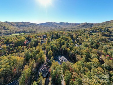 Experience refined mountain living at its finest within The - photo 16
