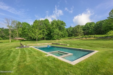 Set on 30 private acres bordering Beartown State Forest, this - photo 3