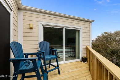 Experience the best of both worlds with this soundside condo