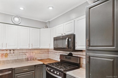 Welcome to 2877 Calvin, a classic cape style residence nestled - photo 12