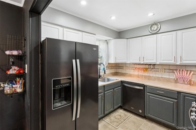 Welcome to 2877 Calvin, a classic cape style residence nestled - photo 13