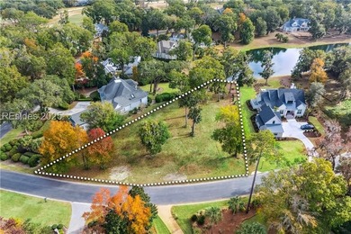 Beautiful homesite with stunning long lake views, nestled on a - photo 3