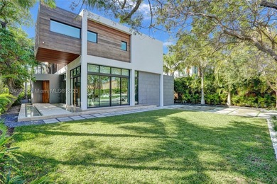 JUST COMPLETED! NEW CONSTRUCTION!!Experience modern beach living - photo 1