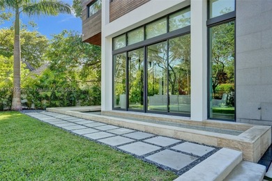 JUST COMPLETED! NEW CONSTRUCTION!!Experience modern beach living - photo 4