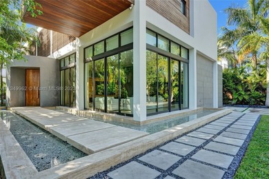 JUST COMPLETED! NEW CONSTRUCTION!!Experience modern beach living - photo 7