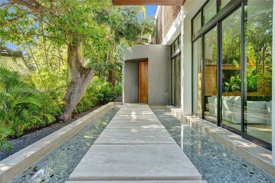 JUST COMPLETED! NEW CONSTRUCTION!!Experience modern beach living - photo 9