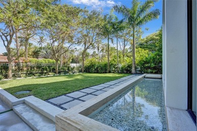 JUST COMPLETED! NEW CONSTRUCTION!!Experience modern beach living - photo 10