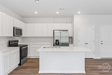 Welcome to The Garrett, a charming two-story home designed with - photo 3