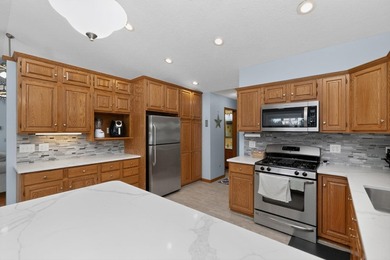 This 4-BD, 2.5-BA, 2,544-sq-ft home on a .251-acre wooded lot on - photo 12