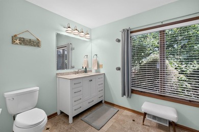 This 4-BD, 2.5-BA, 2,544-sq-ft home on a .251-acre wooded lot on - photo 21