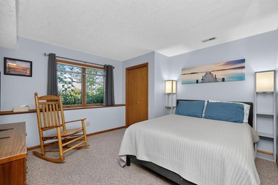 This 4-BD, 2.5-BA, 2,544-sq-ft home on a .251-acre wooded lot on - photo 26