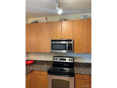 Top floor condo with awesome view of the city & retail area! - photo 37