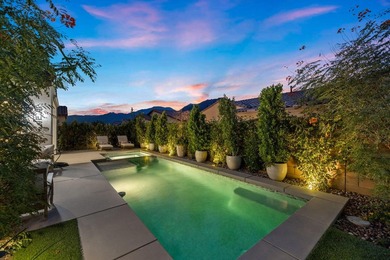 Nestled behind the gates of Floresta, this home stands as one of - photo 3