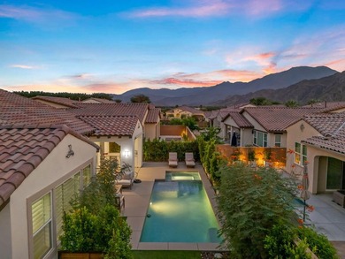 Nestled behind the gates of Floresta, this home stands as one of - photo 4