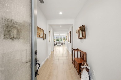 Nestled behind the gates of Floresta, this home stands as one of - photo 9