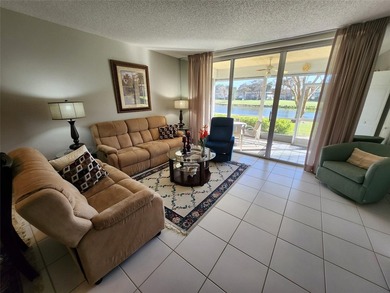 This Lakefront, spacious, Ground Floor 3 Bedroom, 2 Bath Condo - photo 3