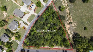 This beautiful corner lot offers nearly one acre of space in the - photo 1