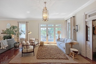 This stately, European-style brick home with striking - photo 12